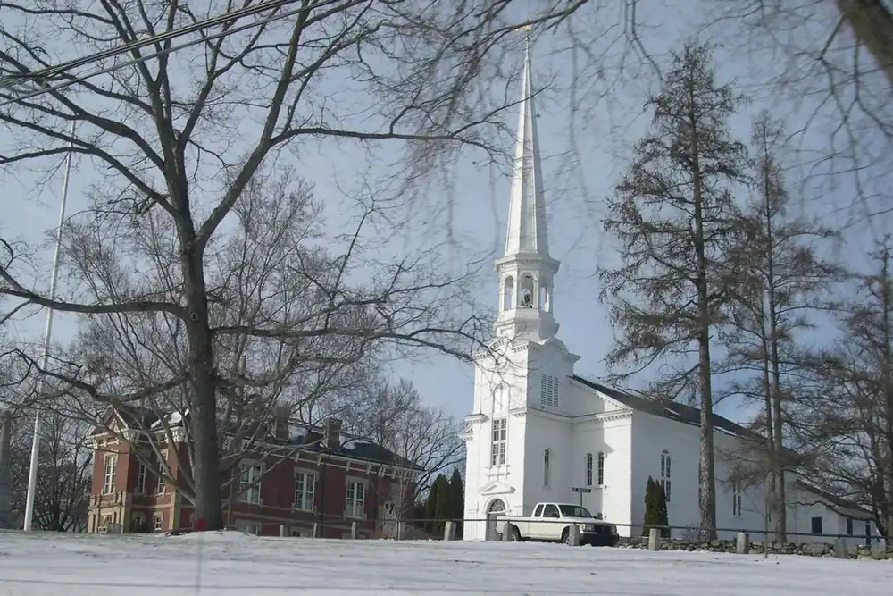 The white church steeple and brick buildings at the center of Southborough, Massachusetts